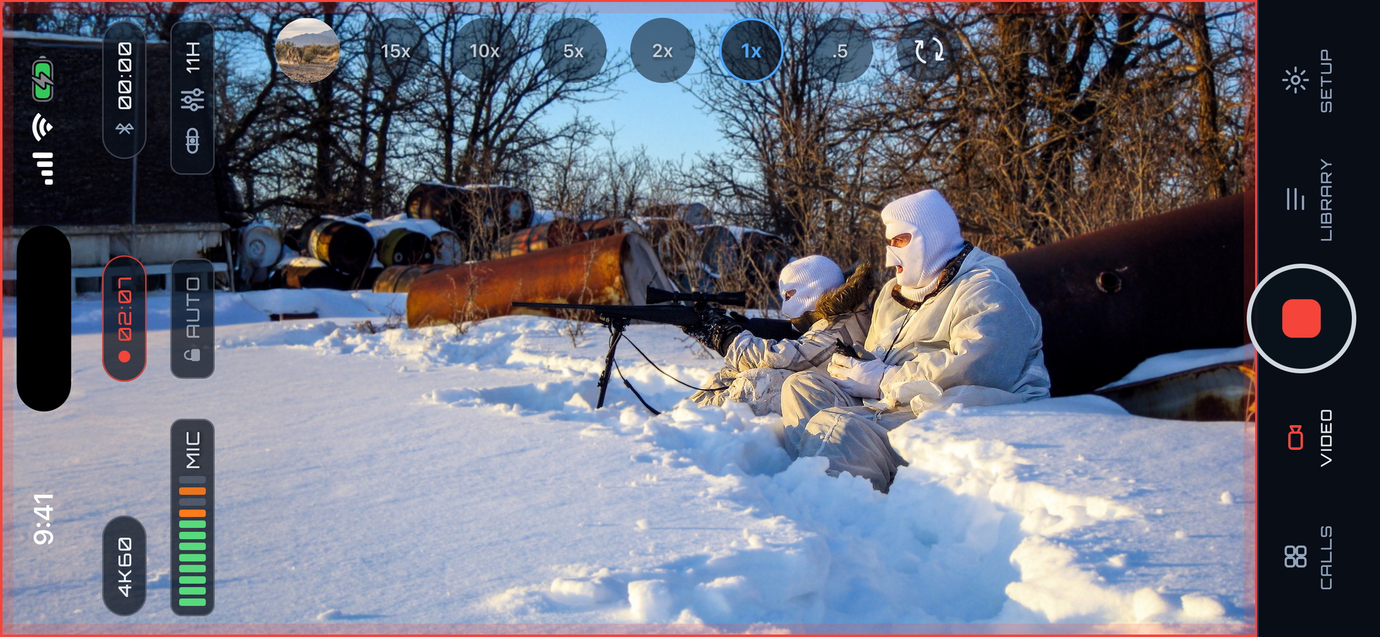 Pro Video filming wide, two hunters in the snow, the whole screen is the camera